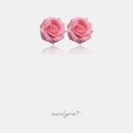 Pink rose bloom stud earrings resembling a real garden rose