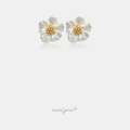 Pair of ivory flower stud earrings with a golden centre of small pearls and crystals.
