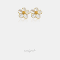Pair of flower stud earrings with five pearly white sculpted petals around a textured gold centre.