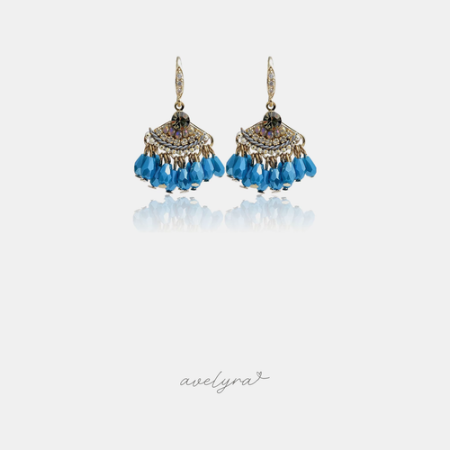 Gold-tone hook earrings with pave-set tops and clusters of blue faceted teardrop beads.