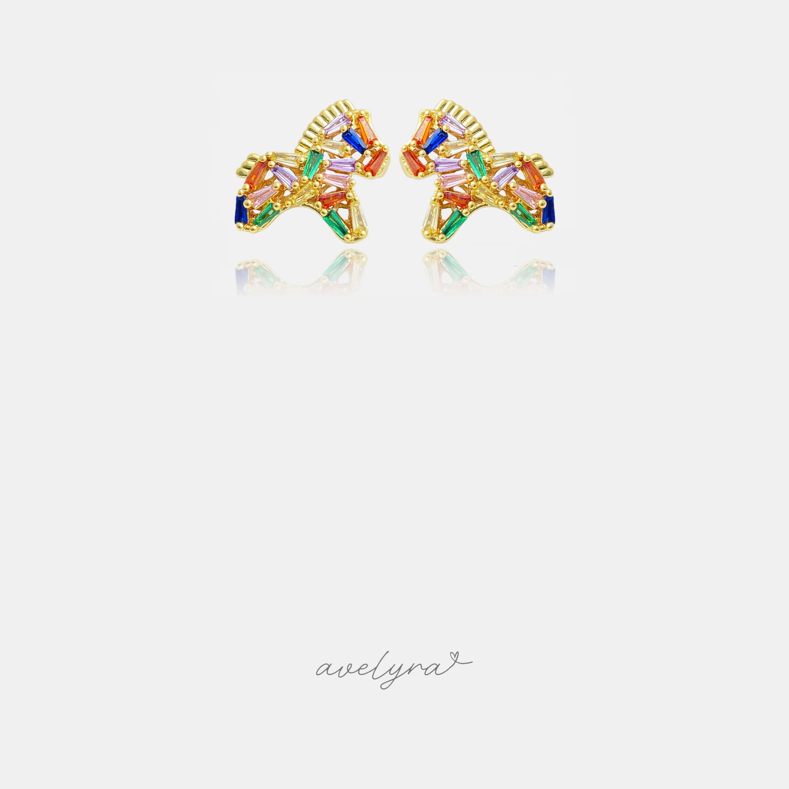 Gold-tone horse-shaped stud earrings set with multicolour baguette crystals.