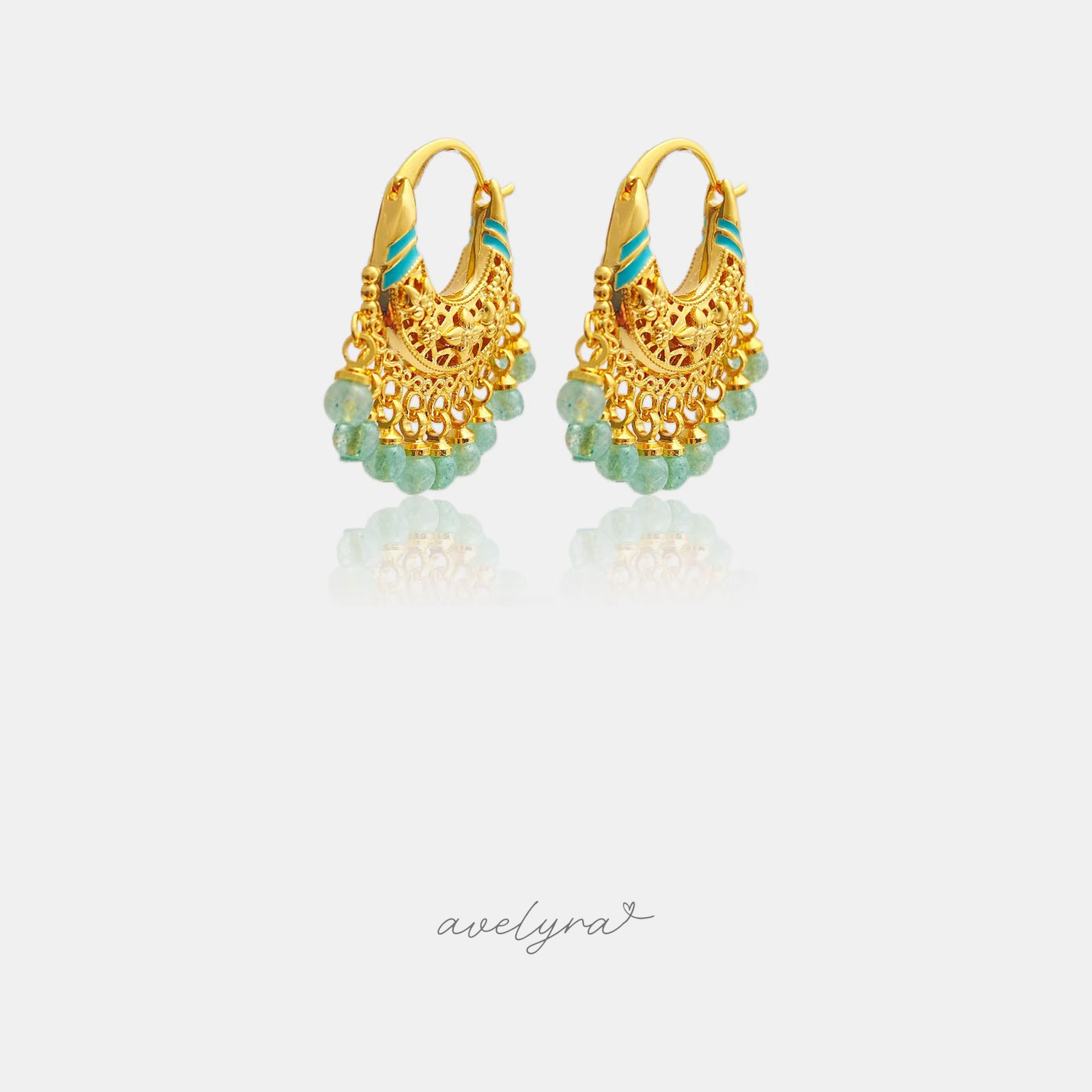 Ornate gold-tone filigree basket hoop earrings with a fringe of aqua-green beads.