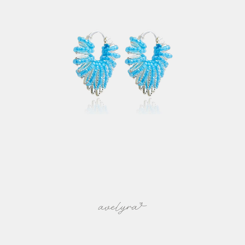 Hoop earrings fanned with rows of sky-blue beads over silver-tone ribs.