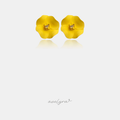 Matte yellow flower stud earrings with a square amber-coloured stone in the centre.