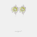 Silver-tone daisy flower earrings with a green centre and clear stone on a thin hoop.