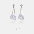 Pair of silver-tone drop earrings each with two clear teardrop-shaped crystals below a polished curved bar.