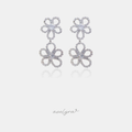 Silver-tone earrings with two openwork pave flowers, each with a clear round stone at the centre, hanging one below the other.