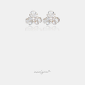 Silver-tone cluster stud earrings made of clear faceted petal-shaped stones.