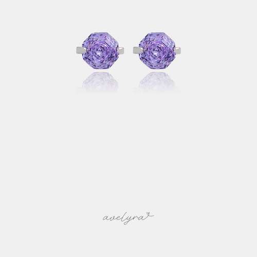 Silver-tone stud earrings each with a single faceted purple stone in a claw setting.