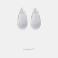 Clear smooth teardrop-shaped stud earrings.