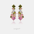 Gold-tone drop earrings clustered with green, pink and clear crystals in mixed geometric cuts.