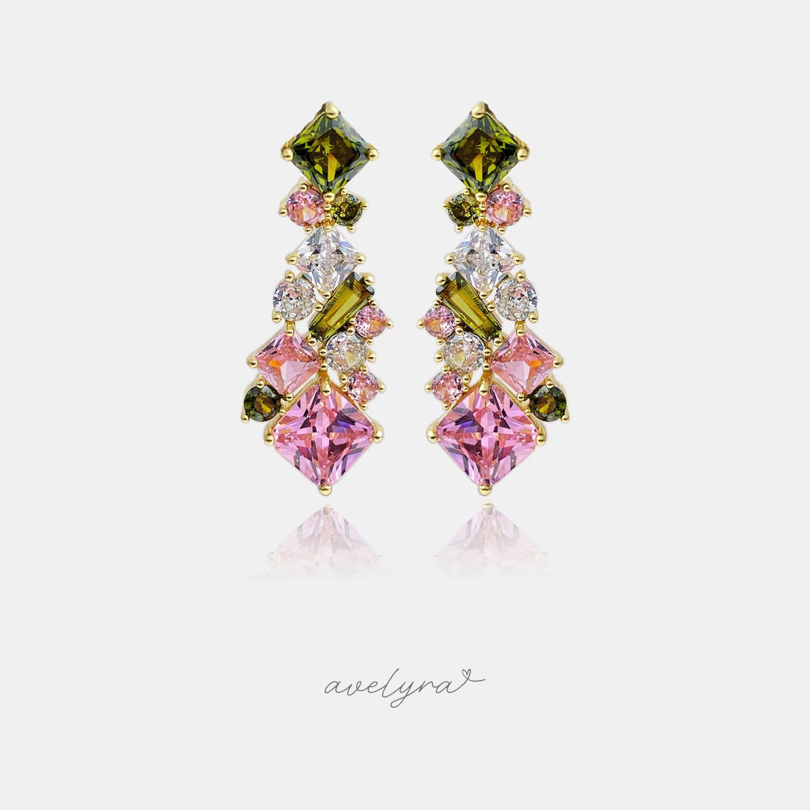 Gold-tone drop earrings clustered with green, pink and clear crystals in mixed geometric cuts.