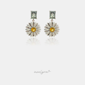 Drop earrings with a rectangular green-grey stone above an ivory daisy flower with a yellow centre.