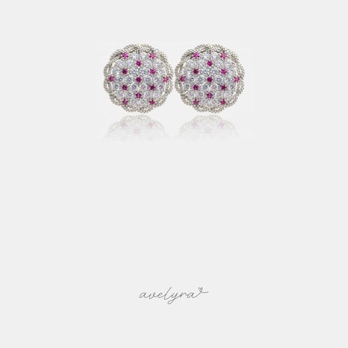Silver-tone round dome stud earrings with clear pave crystals and scattered magenta-pink stones.
