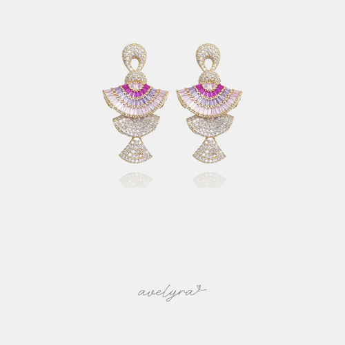 Gold-tone chandelier earrings with tiered fans of pink and purple baguette crystals and pave crescents.