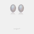 Oval stud earrings with iridescent white opaline centre stones surrounded by a double halo of clear crystals.