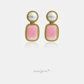 Gold-tone drop earrings with a round pearl top and a rectangular pink stone, both in twisted rope frames.