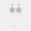 Flower drop earrings with pearl petals, a pink centre bead and a clear crystal flower above.
