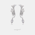 Silver-tone wing-shaped ear climbers covered in crystals with a marquise crystal drop.