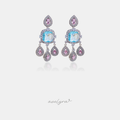 Silver-tone chandelier earrings with an aqua-blue cushion stone, pink accents, and three teardrop drops.