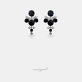 Pair of drop earrings clustering round black stones with arcs of clear crystals.