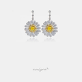 Drop earrings with a daisy flower of clear crystal petals surrounding a square golden-yellow crystal center, hung from two bezel-set crystals.