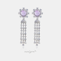 Silver-tone chandelier earrings with lilac round cabochon, crystal halo and cascading teardrop crystal strands.