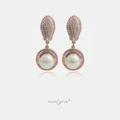 Gold-tone earrings with pink baguette paisley tops and round pearls framed by pink stones.
